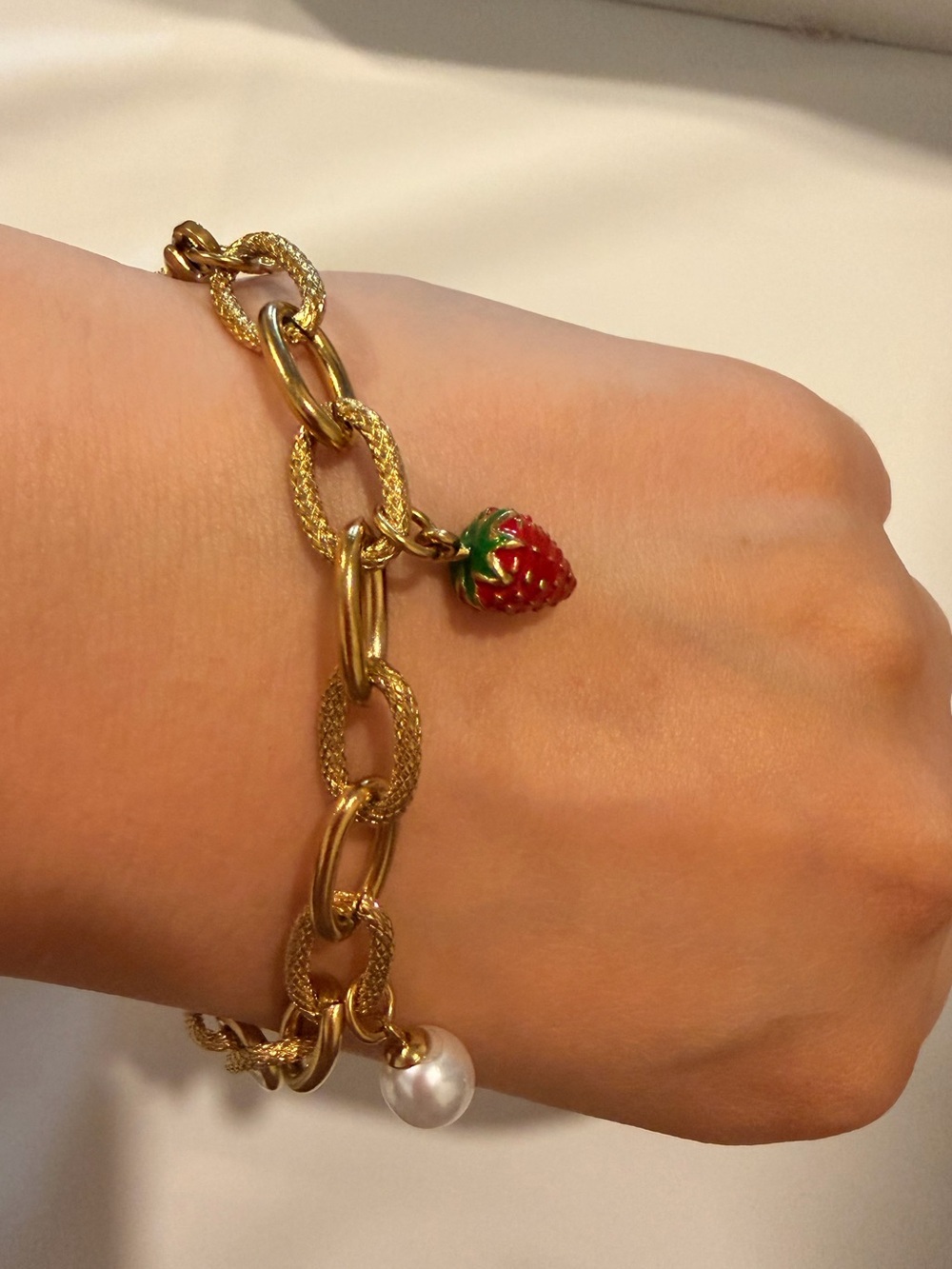 Gold Charm Bracelet with Red and White Accents - Picture 4 of 9